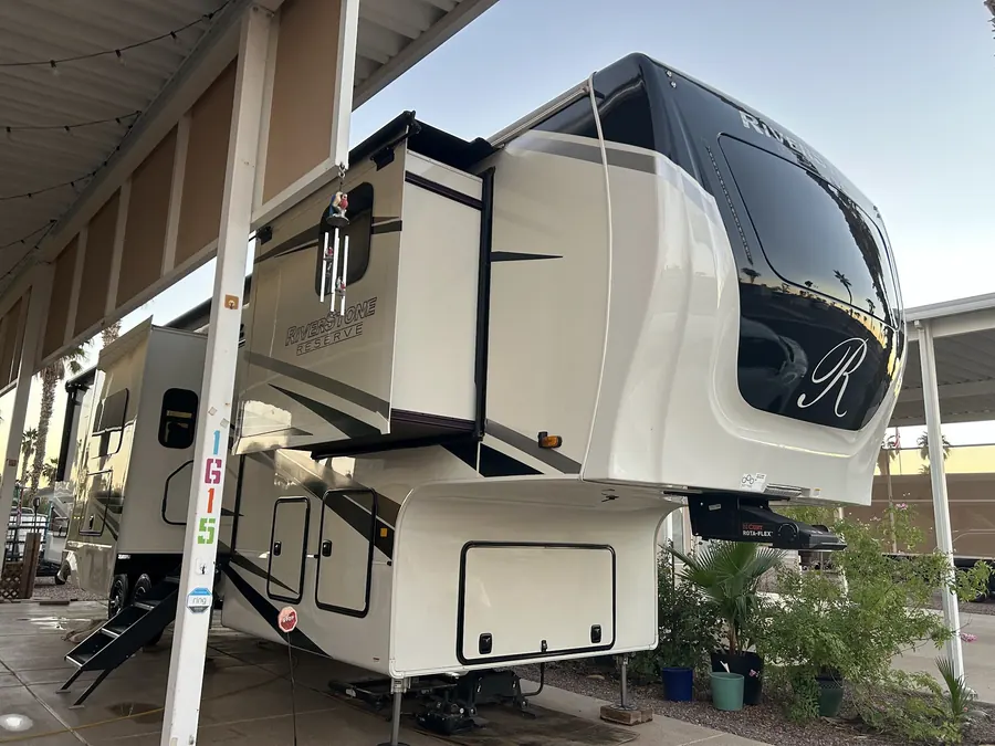 Luxury fifth wheel detailed under covered parking